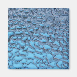 Äkta regndroppar på blått glas magnet