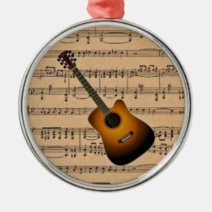 Akustisk gitarr med notbladbakgrund julgransprydnad metall