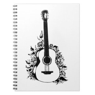 Akustisk gitarr på blommornas bakgrund. sömnlös anteckningsbok
