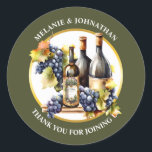 Akvarell vinflaskor druvor land druvor runt klistermärke<br><div class="desc">Välkommen till er vackra bröllopsfest! Denna generativa AI-grafik innehåller tre realistiskt utseende flaskor rödvin som står på en träskiva med svarta eller röda druvklasar. De är inramade av en rund vit inläggning med falsk guldkan och en skogs-/olivgrön bakgrund. Brudparets monogram visas på vinflaskans etikett och de välvda vita redigerbara textmallarna...</div>