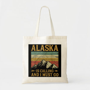 Alaska ringer och jag måste gå. tygkasse