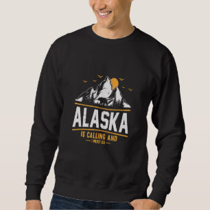 Alaska ropar och jag måste åka 3 lång ärmad tröja