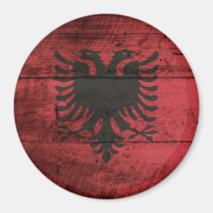 Albaniens Flagga om gammal träbete Magnet