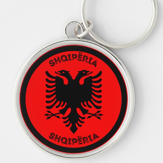 Albaniens kulturarvsemblem rund silverfärgad nyckelring (Framsidan)
