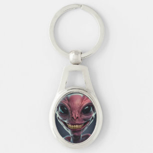 Alien nyckelring. ovalt silverfärgad nyckelring
