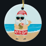 Aloha Hawaiian Santa Tropical Beach jul Julgransprydnad Keramik<br><div class="desc">Julens prydnadsföremål har en söt tomt på en tropisk strand med röd och vit hawaiisk kort med hibiscus mönster,  som sipprar från en ananas och blinkar Aloha-skylten. Originalteckningen KL Lagrar</div>
