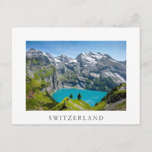 Alp sjö Oeschinensee i Schweiz Vykort