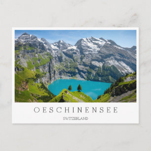 Alp sjö Oeschinensee i Schweiz Vykort