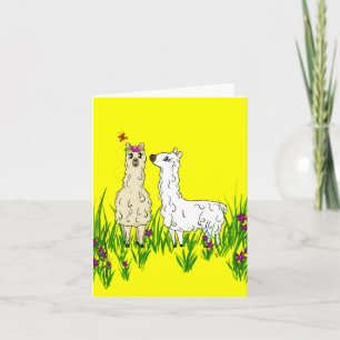 Alpaca i fält om blommor kort