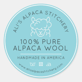 Alpacka ull produkt akva vit stickningsföretag runt klistermärke
