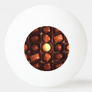 Älskvärt boxas av choklader pingisboll