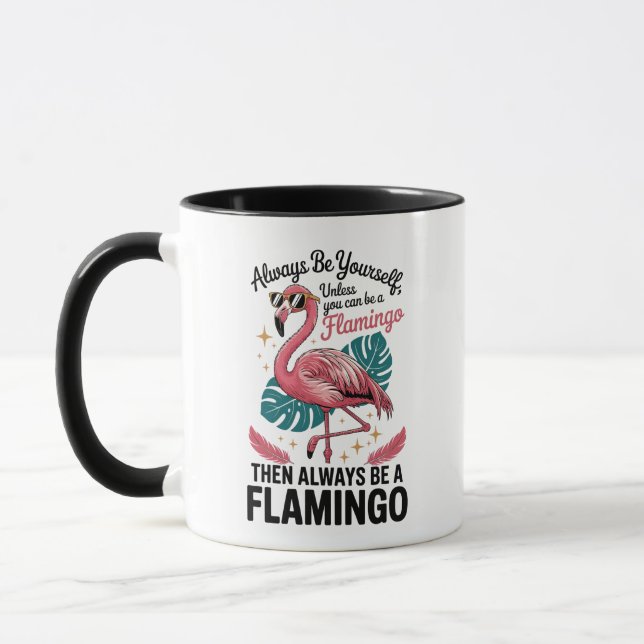 Always Be Yourself Unless You Can Be a Flamingo Mugg (Vänster)