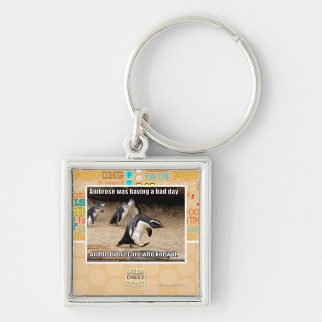 Ambrose hade en dåligadag fyrkantig silverfärgad nyckelring (Framsidan)