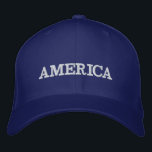 Amerika i blått broderad keps<br><div class="desc">Amerika är broderat i vitt på detta blå,  unisex basebolllock eller någon av de färg som du väljer. Perfekt för att visa din patriotism på den 4 juli,  minnesdagen eller tillfälle.</div>