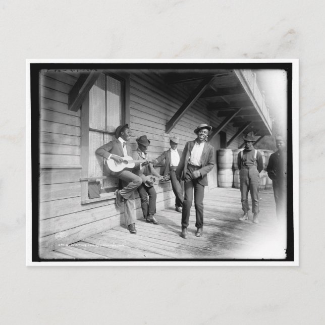 Amerikaner i Afrika som väntar på båten C1902 Vykort (Framsida)