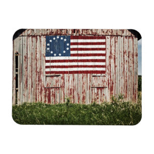 Amerikanska flaggan som målas på ladugård magnet