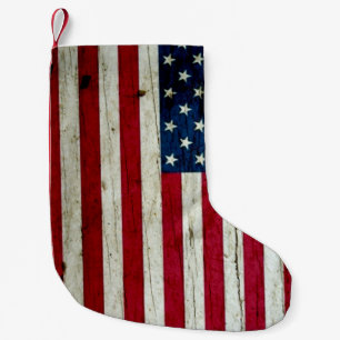 Amerikanska flaggan som målas på trä liten julstrumpa