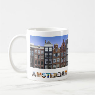Amsterdam inhyser den nederländska kanalen fotoet kaffemugg