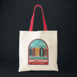 Amsterdam Netherlands Travel Art Vintage Tygkasse<br><div class="desc">Amsterdams reflektorfärgsutformning i ett emblem stil. Det är känt för sitt konstnärliga arv,  sitt utvecklade kanalsystem och sina trånga hus med göjda fasader,  arv från 1700-talets gyllene ålder.</div>
