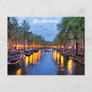 Amsterdamkanal i skymning vykort