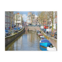 Amsterdamkanalen med båtar