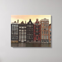 Amsterdamkanalhus vid solnedgång