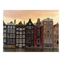 Amsterdamkanalhus vid solnedgång