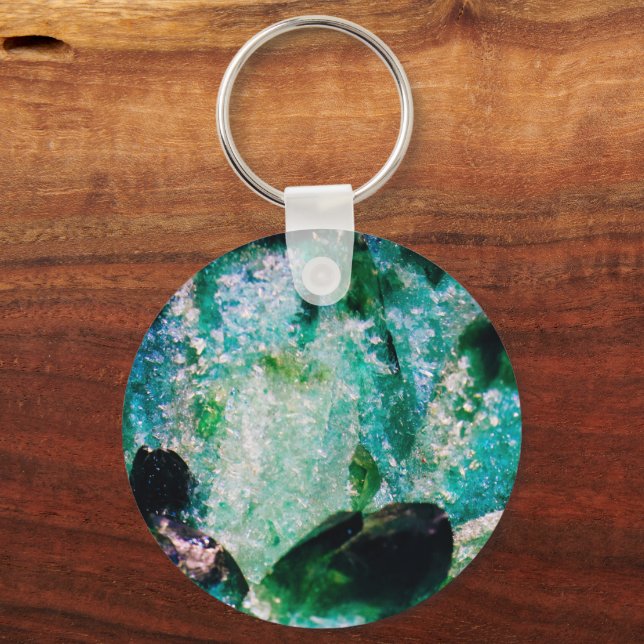 An Aura of Emeralds Nyckelring (Framsida)