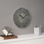 Ancient Infinite Weave Celtic Stone Wall Clock Stor Klocka<br><div class="desc">Bring the timeless power of ancient history into your home. The Infinite Weave Wall Clock features a seamless, circular Celtic knotwork pattern deeply etched into a distressed stone-like texture, inspired by the mysterious megaliths and standing stones found across Ireland and Scotland. This isn't just a clock; it’s a functional piece...</div>