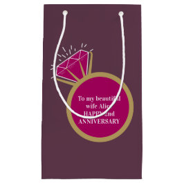 Andra bröllop-årsjubiléet mörk röd gem ring