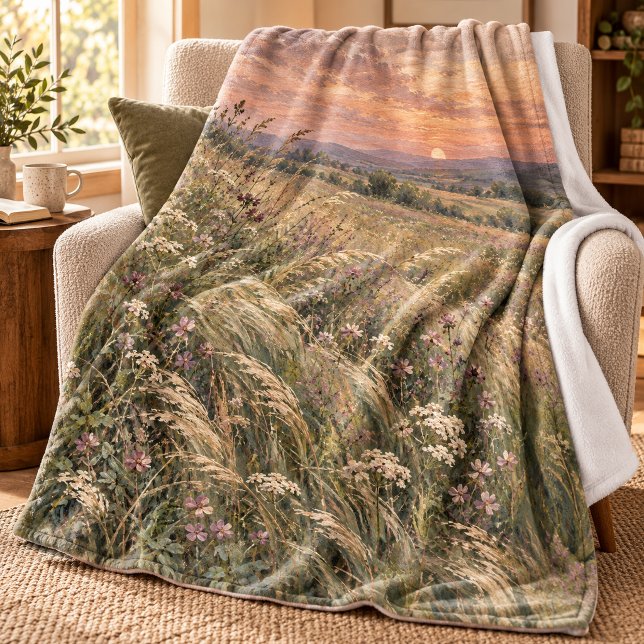 Äng vid skymning Kastfilt Fleecefilt (Styled preview of the 30 x 40 inch fleece lap blanket with printed front and white reverse. Decorative props are not included.)