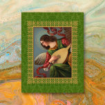 Angel med ett lute Card Julkort<br><div class="desc">Denna fantastiska illustration från sekelvändningen visar en himmelsk ängel som spelar lute mot en grönt som är uppgjord av mönster. Den viktorianska tryckta tolkningen kommer från en originalmålning i Vatikanen. Den ursprungliga kromolitografin visningar klart och mättat färg och en levande punkt mönster. Det här platta kortet har ett gräns med...</div>