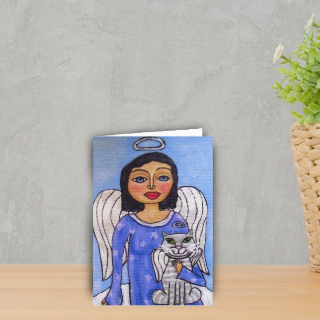 Ängel och katt julkort helgkort (Angle blue eyes on cloud holding white angel cat on blue Merry christmas greeting card.)