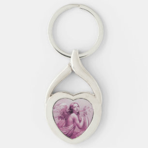 ANGEL PLAYING LYRA ÖVER NEDLÄGGNINGENS rosa Twisted Heart Silverfärgad Nyckelring