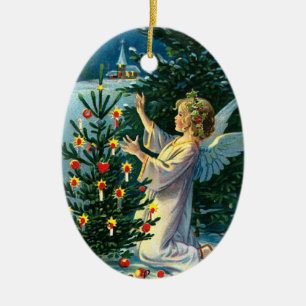 Ängel som dekorerar julgran 2 julgransprydnad keramik
