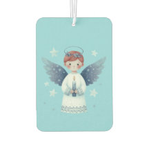 Angel som håller ett ljus