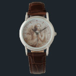 ANGEL SOM SPELAR LYRA ÖVER NEDLÄGGNINGARNA ARMBANDSUR<br><div class="desc">Konstgjord och klassisk vattenfärgsmålning i vit antika bruna färg,  omformad från 1800-talets italienska bra konst</div>