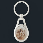 ANGEL SOM SPELAR LYRA ÖVER NORMÖRJA OVALT SILVERFÄRGAD NYCKELRING<br><div class="desc">Konstgjord och klassisk vattenfärgsmålning i vit sepia, brunt färg,  omformad från 1800-talets italienska bra art</div>