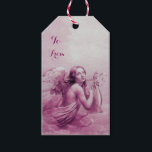 ANGEL SOM SPELAR LYRA ÖVER Rosans Lila Presentetikett<br><div class="desc">Konstgjord och klassisk vattenfärgsmålning i vit lila färg,  som har omarbetats från 1800-talets italienska bra art.</div>