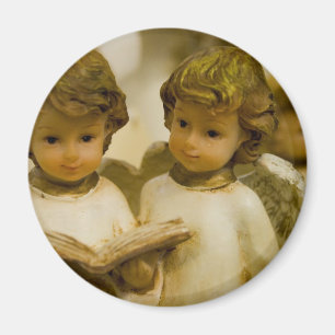 Änglalika statyer magnet