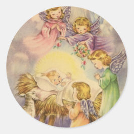 Änglar tittar över Baby Jesus Runt Klistermärke