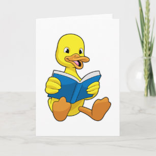 Anka på Reading med bok Kort