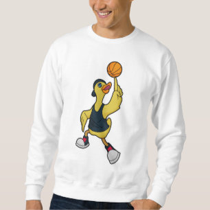 Anka som basketspelare med basket lång ärmad tröja