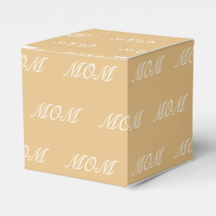 Anpassa en kamellgåva med inledande vit monogram presentaskar