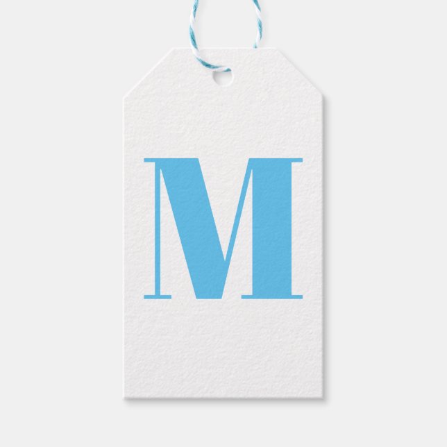 Anpassa inledande ljusblått i monogram presentetikett (Framsidan)