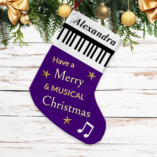 Anpassat namn för Piano Nycklar Lila Musical Instr Liten Julstrumpa (A personalized, purple Christmas stocking with black and white piano keys and festive greeting)