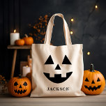 Anpassat namn Jack o lantern Pumpkin Ansikte Hallo Tygkasse<br><div class="desc">Fira Halloween i i stil med den söta pumpen ansikte med anpassningsbar som kan vara personlig med namn. Jack o lantern-designen i roligt har en lycklig-toothy flin!</div>