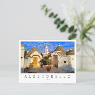 Anpassningsbar, bedövande stad Alberobello, Apulie Vykort
