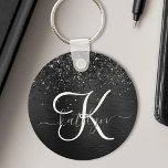 Anpassningsbar Black Glitter Gnistra Monogram Nyckelring<br><div class="desc">Anpassa enkelt den här eleganten för trendig-nyckelkedjan med söt svart mousserande glitter på en svart,  borstad metallisk bakgrund.</div>