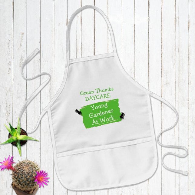 Anpassningsbar Daycare Artist Grönt Spot Papper St Barnförkläde (Try to keep the kids clothes clean with a fun personalized apron in one of three colors. )